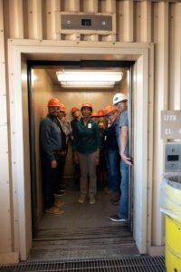 Group photo in the elevator at the IPP as a part of their R6 Listening Tour on May 7, 2025.