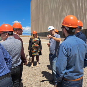 Group learns on the roof of the IPP building as a part of the tour.