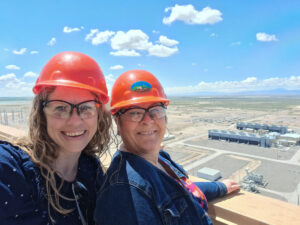 Sara Shaffer, ASPIRE, and Tracy Young, IAB member representing UTA, pose for a selfie off the roof of the IPP building, overlooking the buildings down below on May 7, 2025.