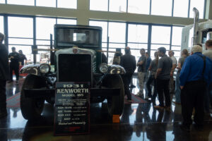 Students learning about 1931 Kenworth truck at Kenworth Sales on June 25, 2025.