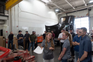 Annie Walpole, and ASPIRE Innovation Analyst, sharing about the first electric Class 6 box truck, created through a contract between Kenworth and ASPIRE.