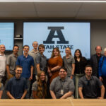 USU ASPIRE Students with Jennifer Seelig, posing for a group photo after the Lunch and Learn event on June 25.