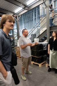 Lion Energy's Engineering Quality Manager Jeremy Pace explaining the intricacies of the testing and production process at Lion Energy on June 25, 2025.