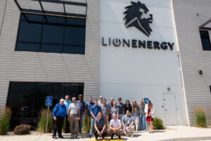 Group photo of ASPIRE students and faculty at Lion Energy.