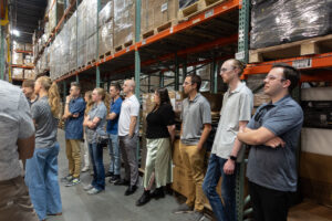 ASPIRE students listening intently during the Lion Energy Tour on June 25, 2025.