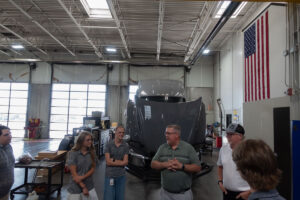 Jason Rappleye from Kenworth Sales Co talking to ASPIRE students during the tour on June 25.