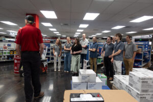 Students learn about the extensive parts store at Kenworth Sales Co on June 25, 2025.
