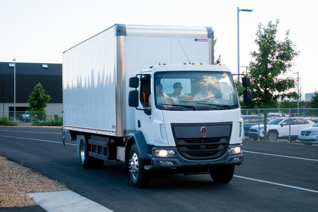 Close-up view of the electrified Class 6 Box Truck as it makes its way around the EVR's electrified track.