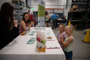 Guests interact with representatives from the UIPA table.