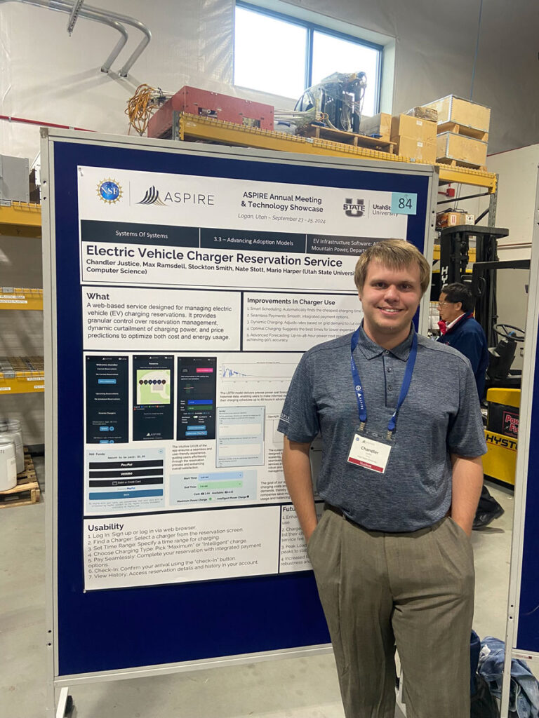 Chandler Justice standing in front of his poster presentation at the Annual Meeting.