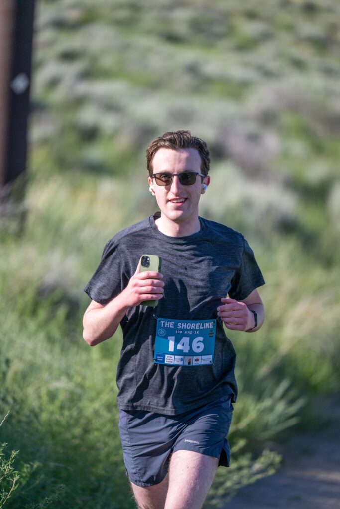 Jackson Morgan running during a 10k race in Logan.