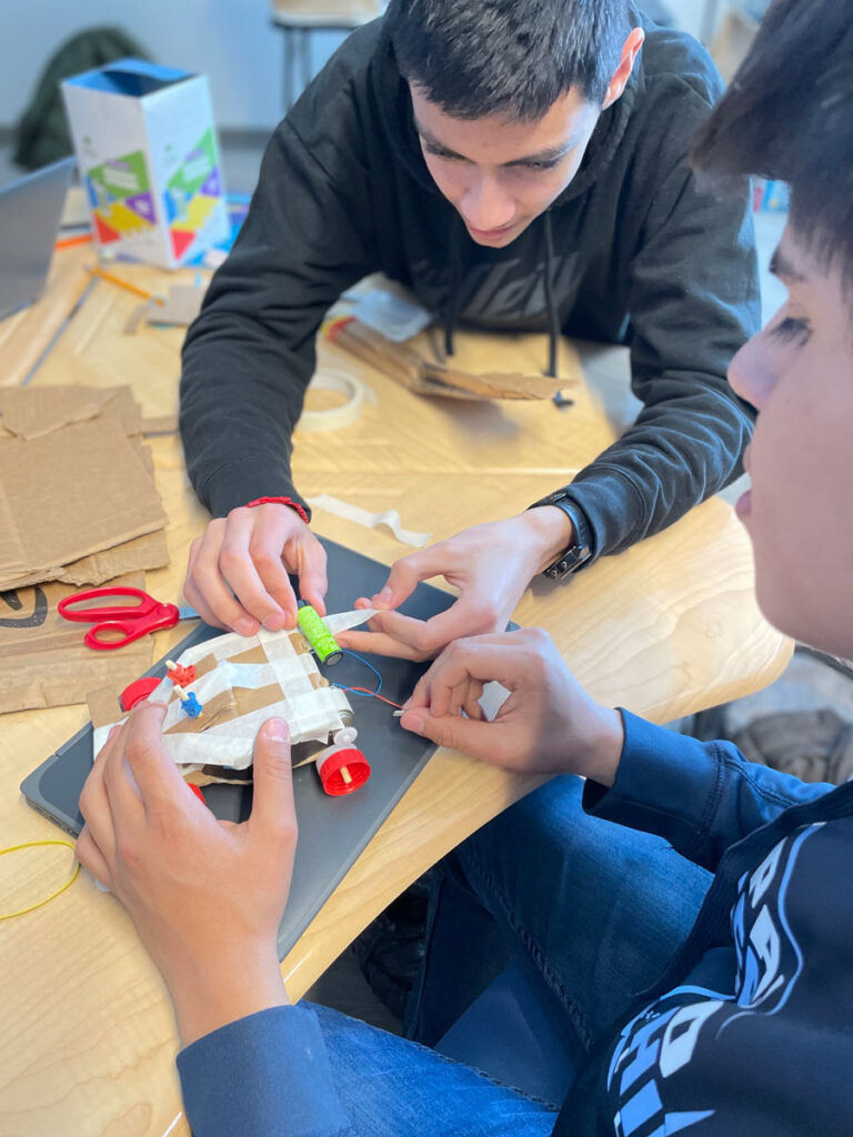 High school students working on CED projects.