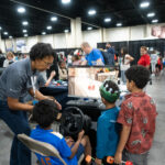 Fawn Groves explains the CARLA simulator to students.