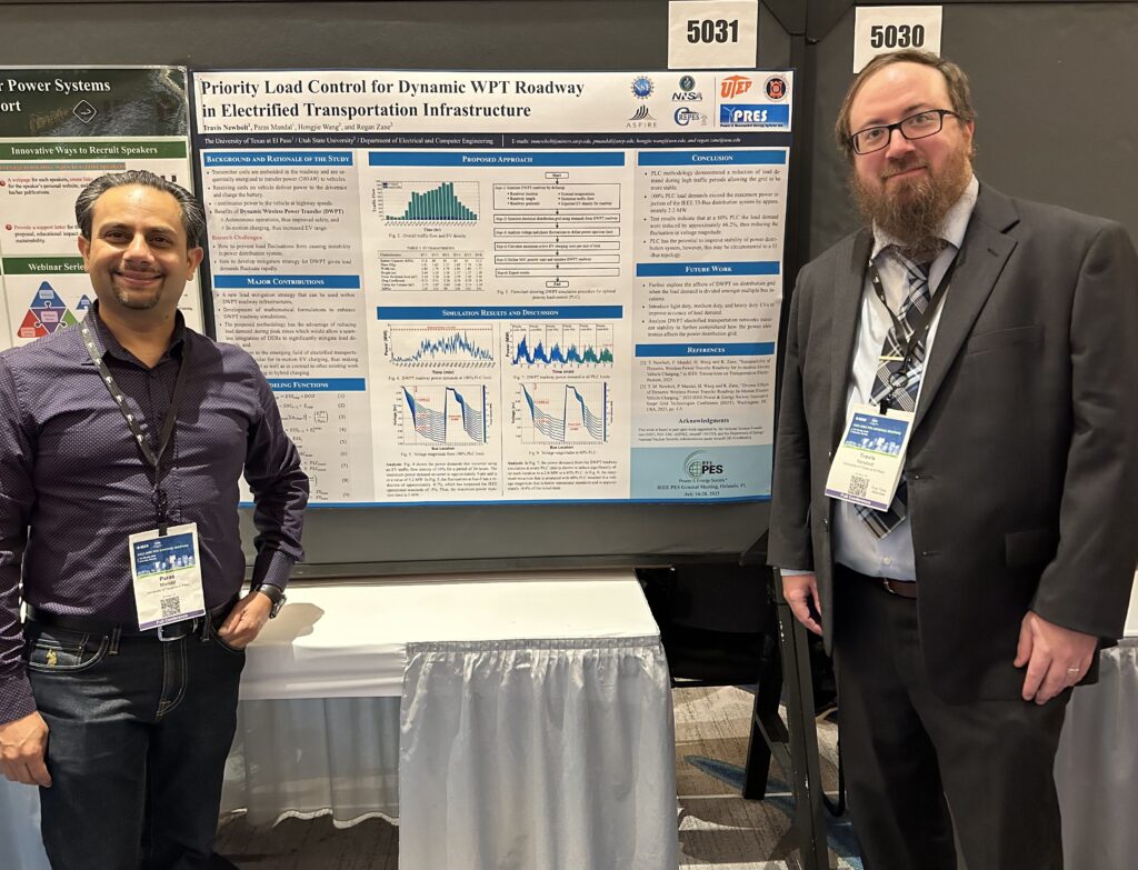 Travis Newbolt and Paras Mandal next to their poster at the conference.