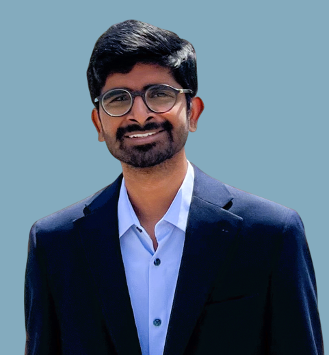 Professional headshot of Dheeraj Etta.