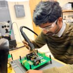 Dheeraj Etta working in the lab.