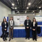 Purdue research group next to their poster at the TRB conference.