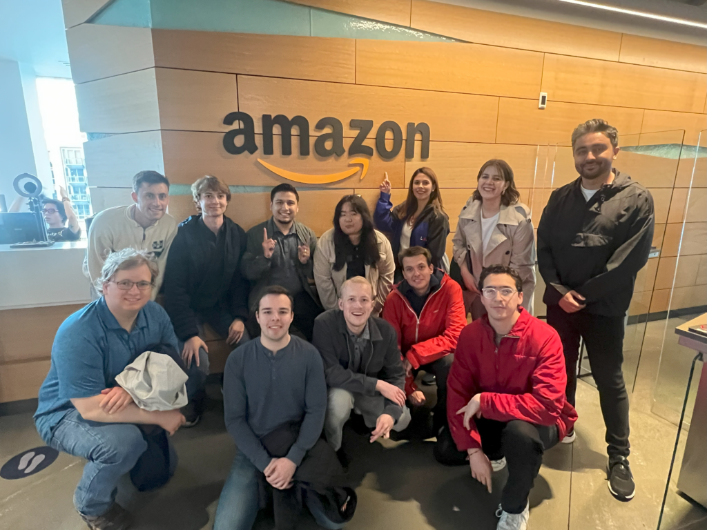 ASPIRE Student Cohort Group in front of the Amazon sign.