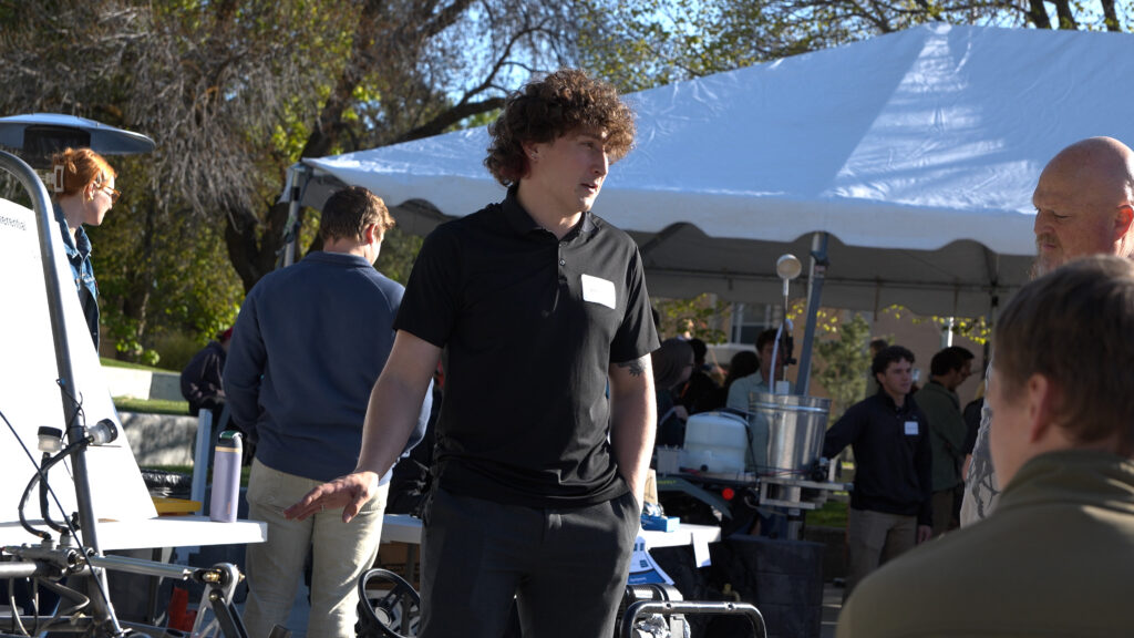 Ethan Black explaining his project at the USU Senior Design Night.