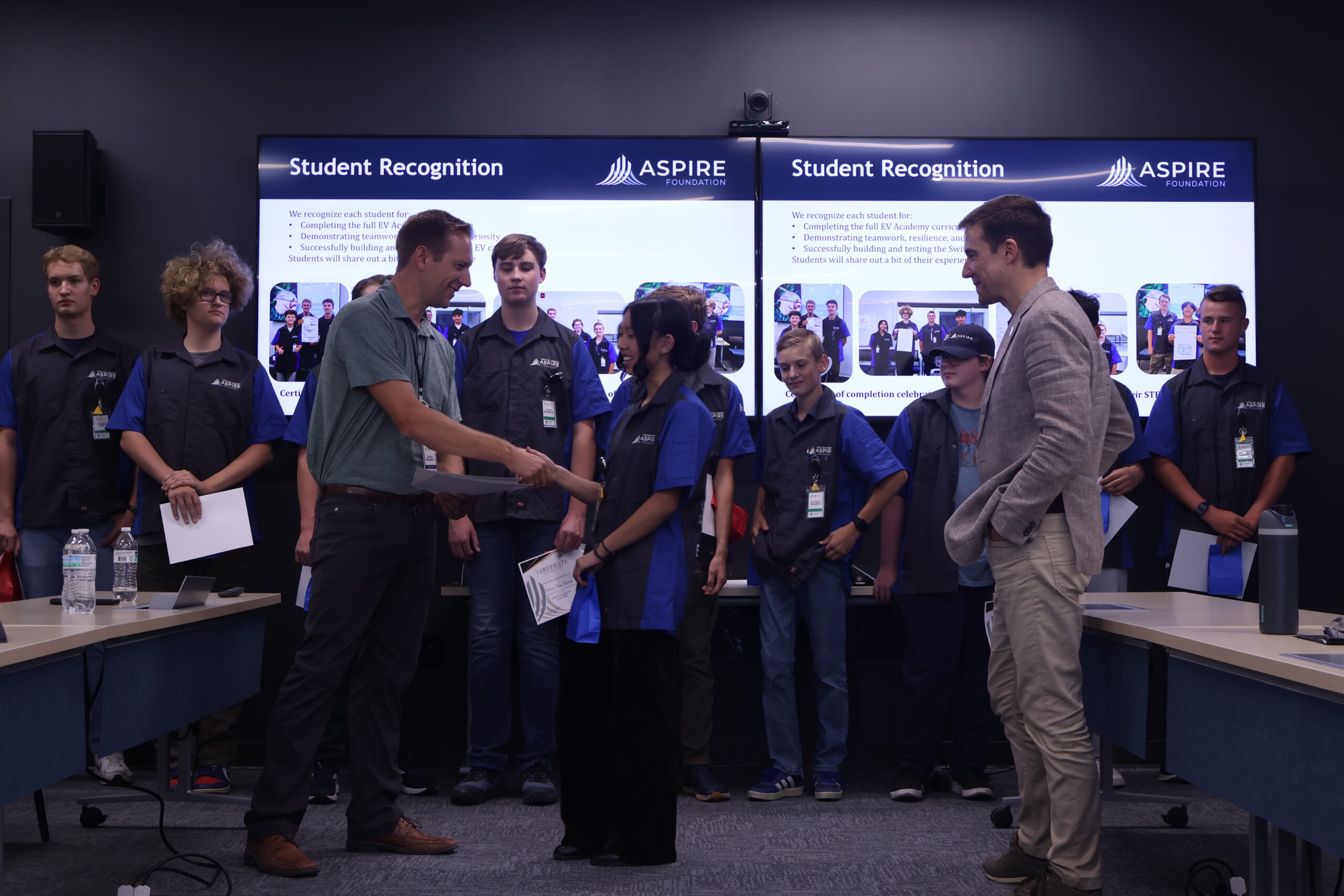 Hannah Sun (middle), freshman, accepting ASPIRE Summer EV Certificate from Dustin Maughan (left), COO/CFO at ASPIRE Research Center
