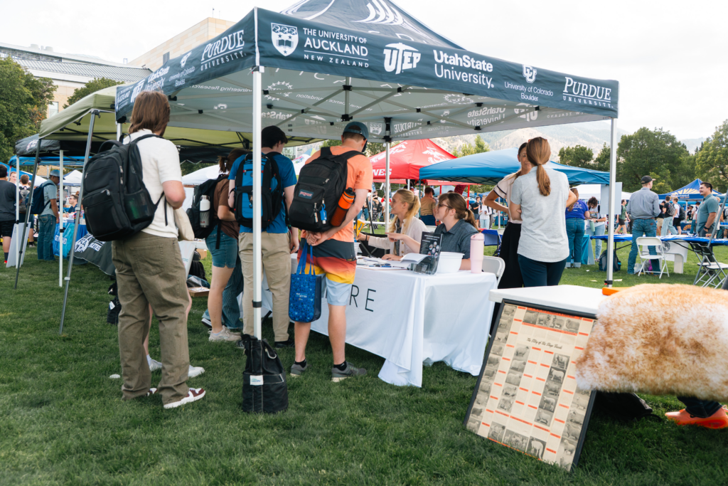 Students gather at USU Day on the Quad visiting the ASPIRE booth.